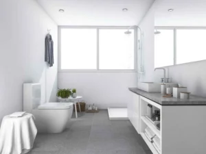 Modern white bathroom with walk-in shower, floating vanity, large mirror, and clean minimalist design showing practical bathroom upgrades you’ve been missing.