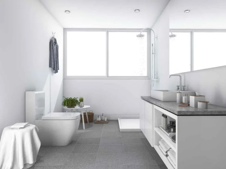 Modern white bathroom with walk-in shower, floating vanity, large mirror, and clean minimalist design showing practical bathroom upgrades you’ve been missing.