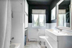 How to Remodel a Small Bathroom with modern vanity, walk in shower, smart storage space, and light colors in a compact bathroom design