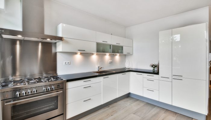 A modern kitchen interior in white colors