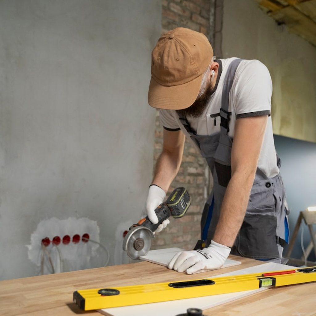 tiler-working-renovation-apartment_23-2149278565